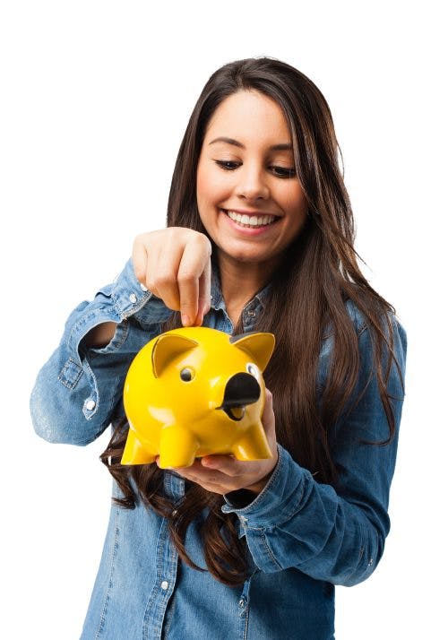 happy young woman with piggy bank